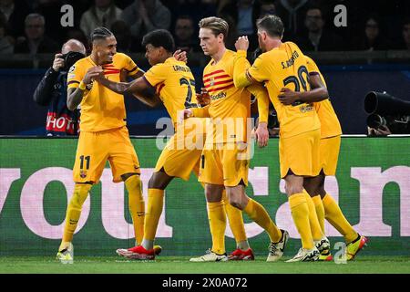 Raphael DIAS BELLOLI (Raphinha) of Barcelona celebrate his goal with teammates during the UEFA Champions League, Quarter-finals, 1st leg football match between Paris Saint-Germain and FC Barcelona on April 10, 2024 at Parc des Princes stadium in Paris, France Stock Photo