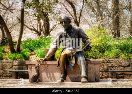 The Hans Christian Andersen sculpture is a favorite place at the Conservatory Water for children's story-time in Central Park, Nyc, USA  2024 Stock Photo