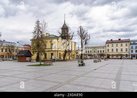 Nowy Targ, Poland - April 6, 2024: View of the town hall building on the Market Square on a cloudy day Stock Photo