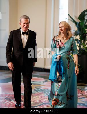 Washington, USA. 10th Apr, 2024. Roy Cooper, Governor of North Carolina, and Kristin Cooper, arrive to attend a state dinner in honor of Japanese Prime Minister Kishida Fumio hosted by US President Joe Biden and First Lady Jill Biden at the White House in Washington on April 10, 2024. Photo by Ting Shen/Pool/Sipa USA Credit: Sipa USA/Alamy Live News Stock Photo