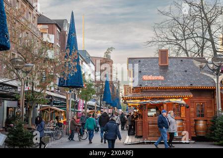 Picture of stands in Duisburg Christmas market, also called weihnachtsmarkt, in winter, in Germany. Stock Photo