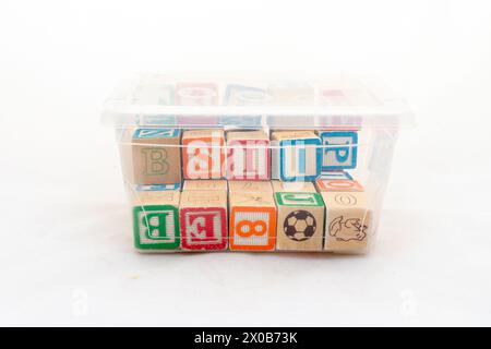 Alphabets wooden blocks in a box Stock Photo