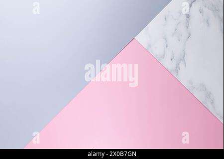 Blue, pink and marble background. Pastel colourful wallpaper, marble texture, copy space. Stock Photo