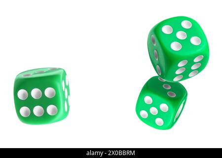 Three green dice in air on white background Stock Photo