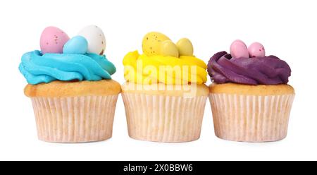 Tasty decorated Easter cupcakes isolated on white Stock Photo