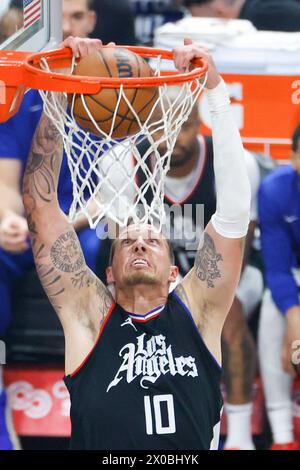 Los Angeles, USA. 10th Apr, 2024. Los Angeles Clippers' Daniel Theis dunks during the 2023-2024 NBA regular season match between Los Angeles Clippers and Phoenix Suns in Los Angeles, the United States, April 10, 2024. Credit: Ringo Chiu/Xinhua/Alamy Live News Stock Photo