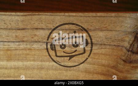 Chatbot ai bot stamp printed on wooden box. Artificial intelligence support robot symbol concept. Stock Photo