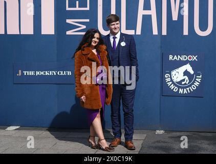 Racegoers on day one of the 2024 Randox Grand National Festival at Aintree Racecourse, Liverpool. Picture date: Thursday April 11, 2024. Stock Photo