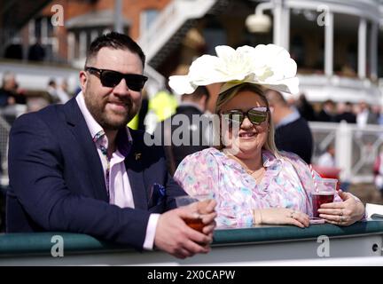 Racegoers on day one of the 2024 Randox Grand National Festival at Aintree Racecourse, Liverpool. Picture date: Thursday April 11, 2024. Stock Photo