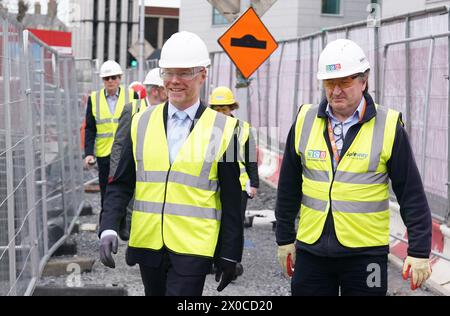 Minister for Health Stephen Donnelly (left) attends the sod turning to mark the commencement of construction at the site of the Ronald McDonald House, at the new children's hospital in Dublin. Picture date: Thursday April 11, 2024. Stock Photo