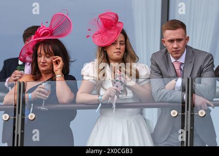 Racegoers during the Randox Grand National 2024 Opening Day at Aintree Racecourse, Liverpool, United Kingdom, 11th April 2024  (Photo by Mark Cosgrove/News Images) Stock Photo