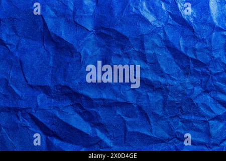 Blue Paper Texture background. Crumpled Blue paper abstract shape background. Stock Photo