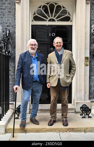 EDITORIAL USE ONLY Co-hosts of The Movers and Shakers podcast Jeremy Paxman (left) and Sir Nicholas Mostyn mark World Parkinson's Day by handing in their 'Parky Charter' petition to Downing Street, asking for more support for people with the condition. Picture date: Thursday April 11, 2024. Stock Photo