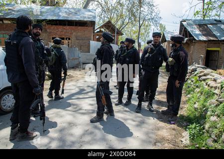 Srinagar, India. 11th Apr, 2024. Indian army soldiers stand on guard near the gun battle site at Frasipora area of Pulwama district, south of Srinagar. Indian police officials claimed to have killed a local militant Danish Aijaz Sheikh, a resident of Srinagar, who recently joined the militant outfit two weeks ago. This encounter occurred after a gap of three months, police officials told the local media. (Photo by Faisal Bashir/SOPA Images/Sipa USA) Credit: Sipa USA/Alamy Live News Stock Photo