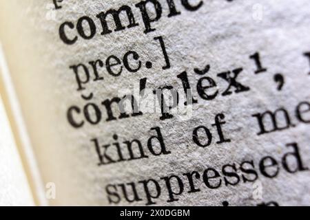 Word complex on dictionary page, macro close-up Stock Photo