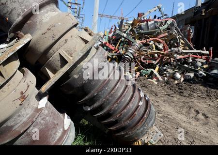 Non Exclusive: KHARKIV, UKRAINE - APRIL 10, 2024 - An energy facility is damaged by Russian shelling, Kharkiv, northeastern Ukraine. Stock Photo