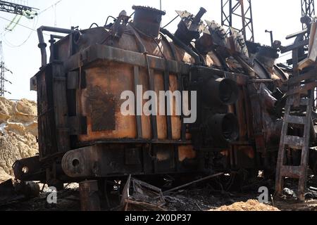 Non Exclusive: KHARKIV, UKRAINE - APRIL 10, 2024 - An energy facility is damaged by Russian shelling, Kharkiv, northeastern Ukraine. Stock Photo