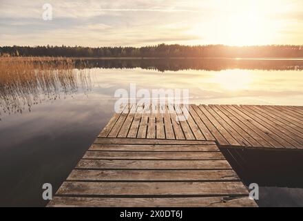 Pier on a lake at sunset, West Pomeranian Voivodeship, Poland. Stock Photo