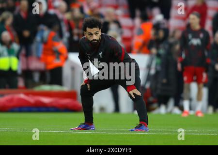 Liverpool, UK. 11th Apr, 2024. Liverpool, England, April 11th 2024: Mohamed Salah (11 Liverpool) warming up during the UEFA Europa League game between Liverpool and Atalanta at Anfield in Liverpool, England (Alexander Canillas/SPP) Credit: SPP Sport Press Photo. /Alamy Live News Stock Photo