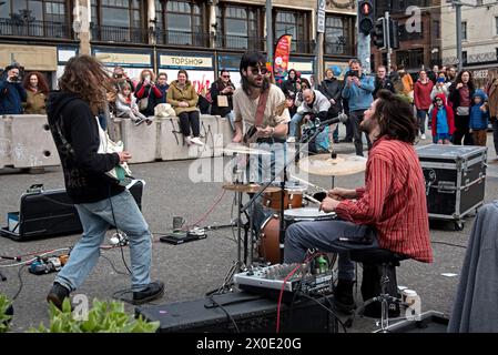 The Gulls are a three-piece Rock & Roll band playing live on Waverley Bridge, Edinburgh, Scotland, UK Stock Photo