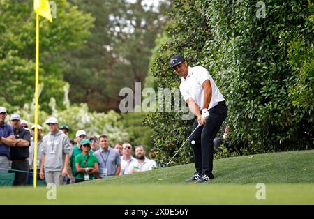 Augusta, United States. 11th Apr, 2024. Xander Schauffele chips to the fourth green during the first round of the Masters Tournament at Augusta National Golf Club in Augusta, Georgia on Thursday, April 11, 2024. Photo by John Angelillo/UPI Credit: UPI/Alamy Live News Stock Photo