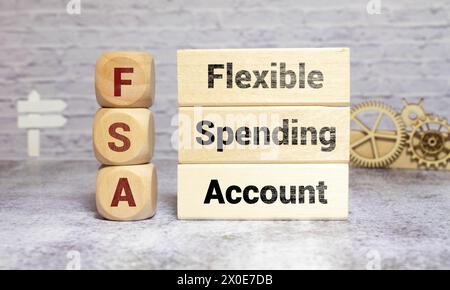 Flexible Spending Account FSA is shown on the conceptual business photo using the text. Stock Photo