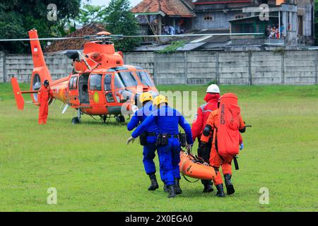 Action of the National Search and Rescue Agency BASARNAS evacuated victims of natural disasters in simulating earthquake response. Stock Photo