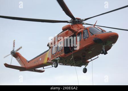 National Search and Rescue Agency (Basarnas) in action evacuated victims of natural disasters using helicopters in an earthquake response simulation. Stock Photo