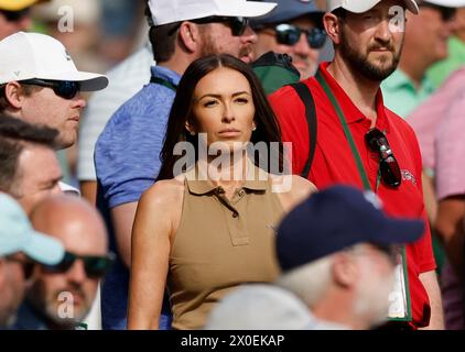 Augusta, United States. 11th Apr, 2024. Paulina Gretzky, wife of Dustin Johnson, watches the first round of the Masters Tournament at Augusta National Golf Club in Augusta, Georgia on Thursday, April 11, 2024. Photo by John Angelillo/UPI Credit: UPI/Alamy Live News Stock Photo