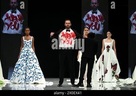 Milan, Italy. 07th Apr, 2024. SI SPOSAITALIA Collezioni 2024, Brindal Week at Fieramilano City in Milan, Italy on April 5-8, 2024. Presentation of wedding dresses and ceremony. In the photo: Justin Alexander Signature fashion show with street artist Gioele Corradengo. (Photo by Laura Villani/Sipa USA) Credit: Sipa USA/Alamy Live News Stock Photo