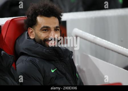 Liverpool, UK. 11th Apr, 2024. Liverpool, England, April 11th 2024: Mohamed Salah (11 Liverpool) sits on the bench during the UEFA Europa League game between Liverpool and Atalanta at Anfield in Liverpool, England (Alexander Canillas/SPP) Credit: SPP Sport Press Photo. /Alamy Live News Stock Photo