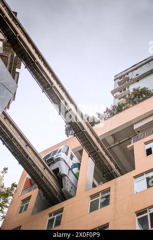 August 10, 2021, Chongqing, China: The light rail passed through the building in Liziba, Yuzhong District Stock Photo