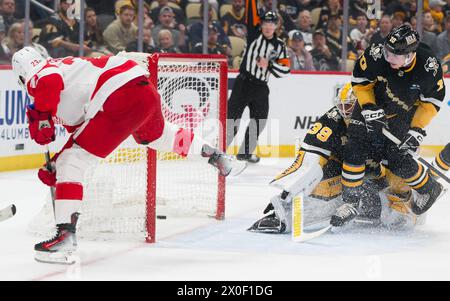 Pittsburgh, United States. 11th Apr, 2024. Detroit Red Wings left wing Lucas Raymond (23) scores his second goal of the first period against the Pittsburgh Penguins at PPG Paints Arena in Pittsburgh on Thursday, April 11, 2024. Photo by Archie Carpenter/UPI. Credit: UPI/Alamy Live News Stock Photo