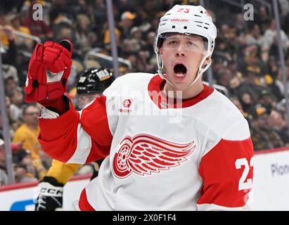 Pittsburgh, United States. 11th Apr, 2024. Detroit Red Wings left wing Lucas Raymond (23) celebrates his goal during the first period against the Pittsburgh Penguins at PPG Paints Arena in Pittsburgh on Thursday, April 11, 2024. Photo by Archie Carpenter/UPI. Credit: UPI/Alamy Live News Stock Photo