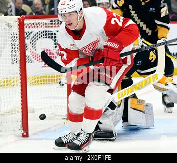 Pittsburgh, United States. 11th Apr, 2024. Detroit Red Wings left wing Lucas Raymond (23) scores during the first period against the Pittsburgh Penguins at PPG Paints Arena in Pittsburgh on Thursday, April 11, 2024. Photo by Archie Carpenter/UPI. Credit: UPI/Alamy Live News Stock Photo