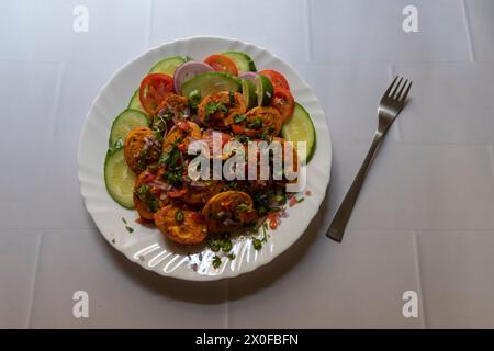 Indian style egg masala curry with spices and herbs. View from top. Stock Photo