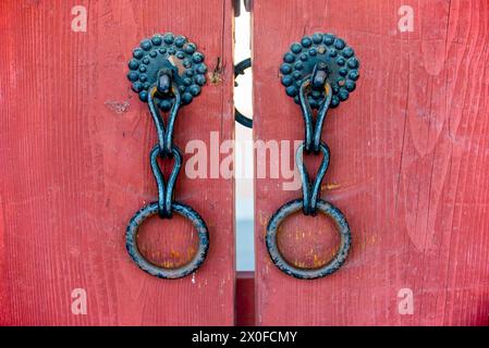 Korean traditional knocker. Ancient knocker. A traditional lock on a wooden door. Korean traditional lock. Stock Photo