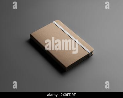 Closed craft notebook template with white elastic band, textured hard cover, for design, advertising. Diary with brown pages, isolated with shadows on Stock Photo