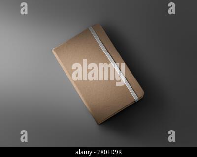 Mockup of closed craft notebook, diagonal top view, with white elastic band, textured hard cover, shadows on background. Organizer for design, print. Stock Photo