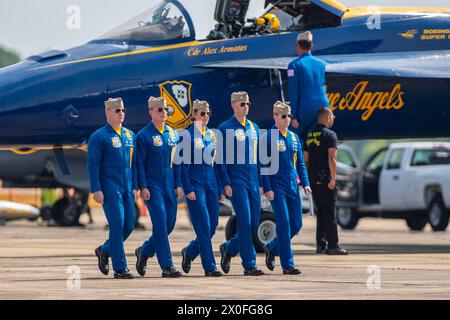 April 07, 2024: Officers of the U. S. Navy Flight Demonstration Squadron Blue Angels (L-R) #6 Commander Thomas Zimmerman, #5 Lieutenant Commander Griffin Stangel, #4 Lieutenant Commander Amanda Lee, #3 Lieutenant James Wesley Perkins, #2 Lieutenant Commander Jack Keilty and #1 Commander Alexander P. Armatas (entering cockpit) walk to their Boeing F/A-18 Super Hornet aircraft in preperation of their aerobatic demonstration at the Beyond The Horizon Air and Space Show at Maxwell Air Force Base in Montgomery, Alabama. Mike Wulf/CSM Stock Photo