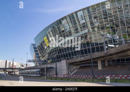Kloten, Switzerland - 20 May 2022: Exterior of the modern building The Circle at Zurich Airport. It is a complex building for shopping and business ex Stock Photo