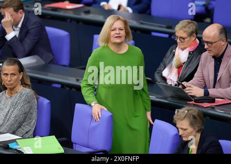 Deutscher Bundestag, 164. Plenarsitzung Innenministerin Nancy Faeser SPD steht gelassen an ihrem Platz im an der Regierungsbank bei der 164. Sitzung des Deutschen Bundestag in Berlin, 12.04.2024 Berlin Berlin Deutschland *** German Bundestag, 164 plenary session Interior Minister Nancy Faeser SPD stands calmly at her place at the government bench at the 164 session of the German Bundestag in Berlin, 12 04 2024 Berlin Berlin Germany Stock Photo