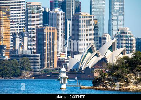 Sydney Opera House, high rise buildings, Robertsons Point lighthouse at Cremorne Point, Sydney offices and skyscrapers, NSW,Australia Stock Photo
