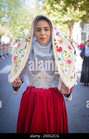 NUORO, ITALY - 2017 JULY 16 - traditional Sardinian dress worn by beautiful girls Stock Photo