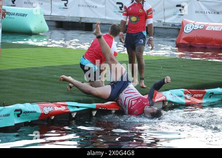 Sydney, Australia. 12th April 2024. The BSc Aqua Rugby Festival on a 30x30 metre floating pontoon at Darling Harbour. Pictured: Men's final. Credit: Richard Milnes/Alamy Stock Photo