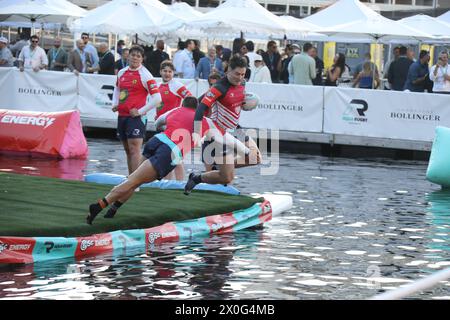 Sydney, Australia. 12th April 2024. The BSc Aqua Rugby Festival on a 30x30 metre floating pontoon at Darling Harbour. Pictured: Men's final. Credit: Richard Milnes/Alamy Stock Photo