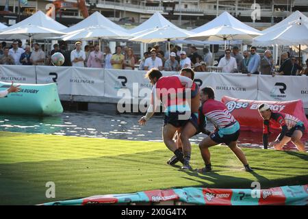 Sydney, Australia. 12th April 2024. The BSc Aqua Rugby Festival on a 30x30 metre floating pontoon at Darling Harbour. Pictured: Men's final. Credit: Richard Milnes/Alamy Stock Photo