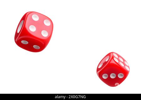 Two red dice in air on white background Stock Photo