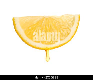 Juice dripping from slice of lemon isolated on white Stock Photo