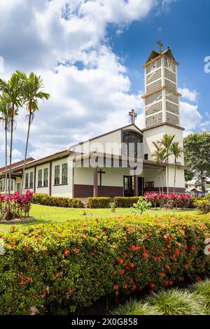 Church of La Fortuna de San Carlos park and flowers in Costa Rica Central America Stock Photo